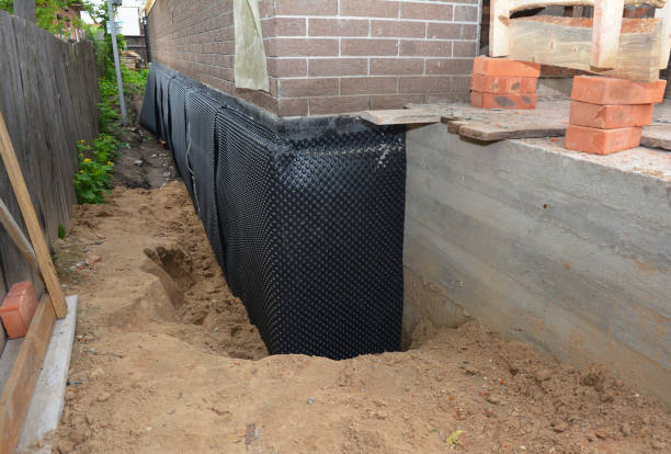 SJ Waterproofing Pros technician performing targeted Basement Waterproofing assessment in Bogota, NJ